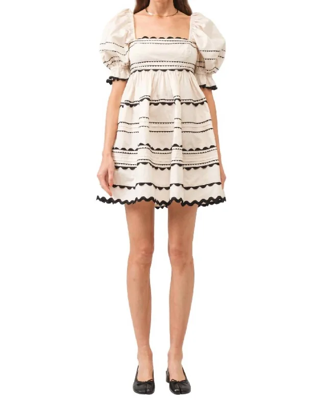 Jennie Mini Dress In Cream Stylish Pleated Skirt